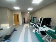 A room with exercise equipment
AI-generated content may be incorrect.